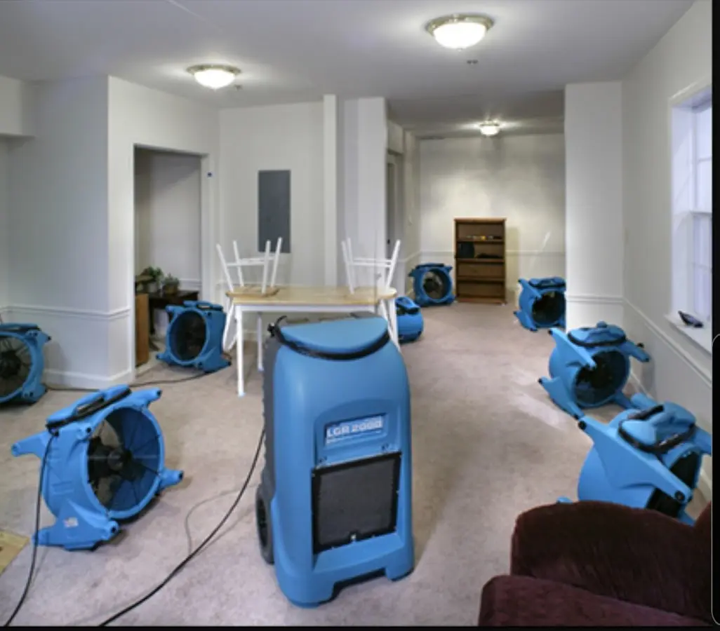 Air movers and dehumidifier setup for Water Damage Restoration in Childress